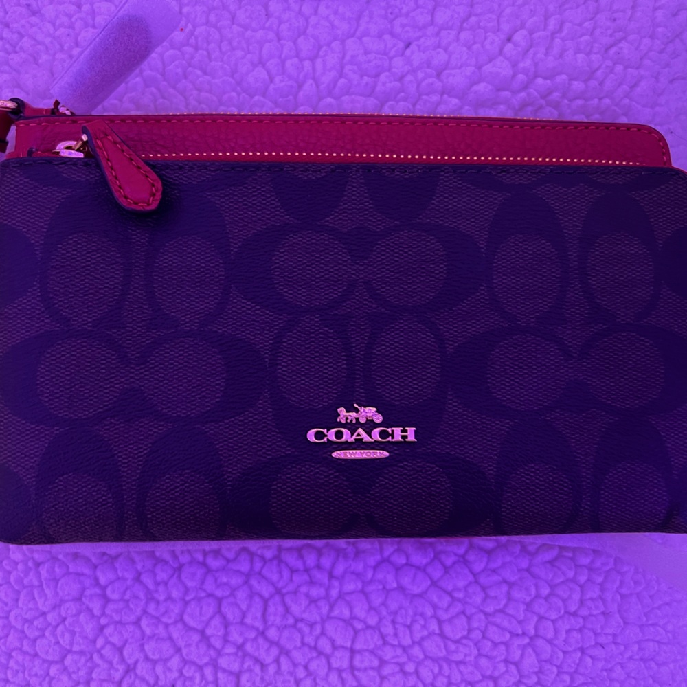 Brand New with tags Coach double wristlet in signature canvas and red leather.